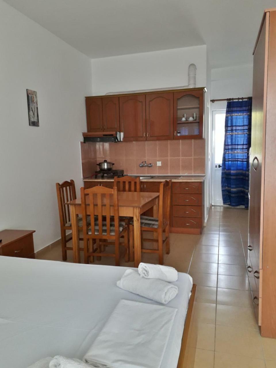Rooms&apartments Analipsi